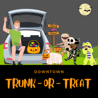 Car with trunk open. Children dressed up in Halloween costumes.