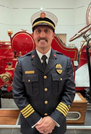 Assistant Fire Chief Ret Tompkins in uniform.