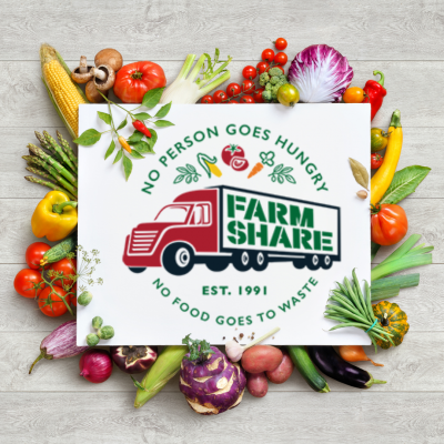 Image of a semi truck and trailer encircled with fruits and vegetables 